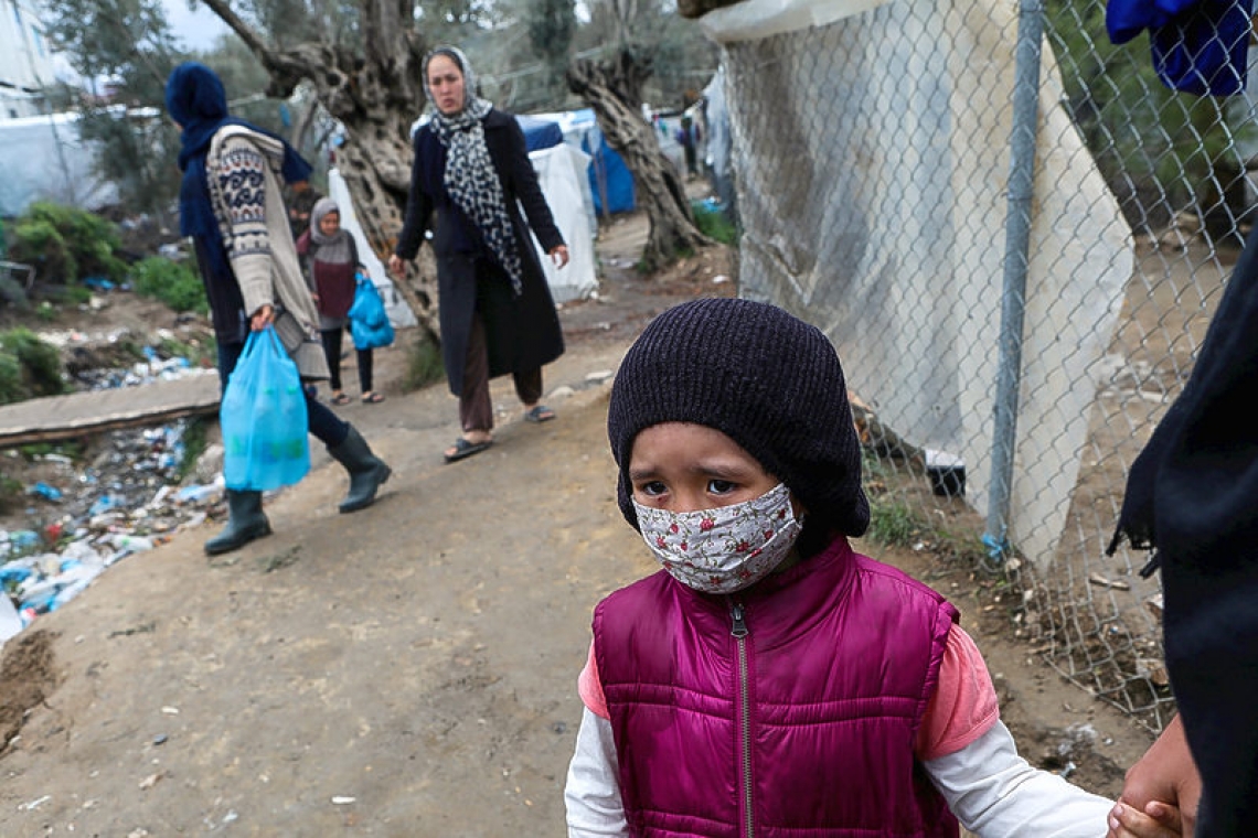 Greece quarantines camp after migrants test positive